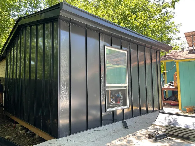Black standing seam metal wall panels for Roof Inspection in South Lakes