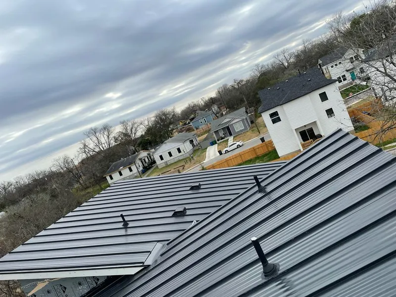 Standing seam metal roof panels with vents for Skylight Repair in South Lakes